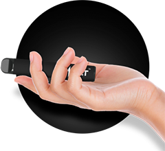 A black vape pod in a hand